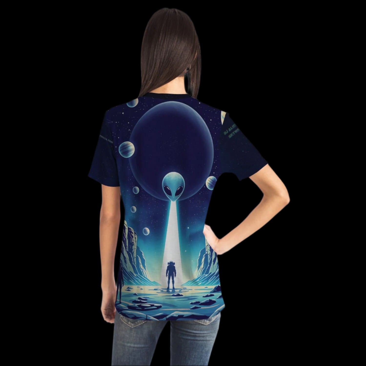 Person wearing a t-shirt with an alien design on the back